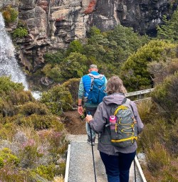 guests hiking in tongariro National Park to Taranaki Falls SN17FEB26