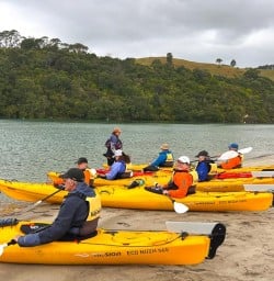 guests kayak in Cathedral Cove SN10MAR26