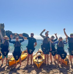 guests kayaking Cathedral Cove SN03MAR26