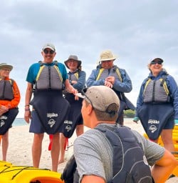 guests learning how to kayak in Cathedral Cove SN24FEB26