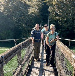 guests on a bridge in South Island hiking GE03NOV25