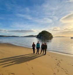 guests on beach in Stewart Island GW24FEB26