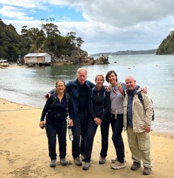 guests on beach in Stewart Island GW27JAN26