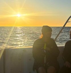 guests on boath dolphin swim MP03NOV25