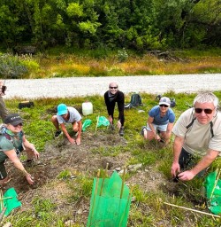 guests planting trees in Arrowtown GE26JAN26