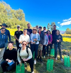 guests planting trees in Arrowtown RM09MAR26