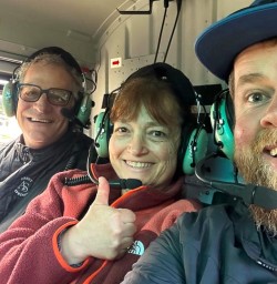 guide Blake and guests on heli flight to Siberia Valley GE16MAR27