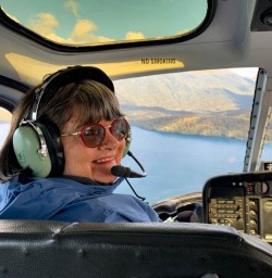 Happy guest flying into Stewart Island