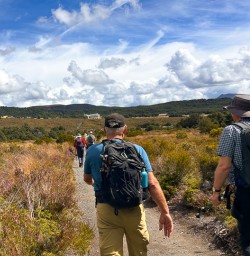 happy guests explore tongariro national park SN24FEB26