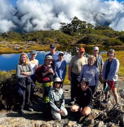 happy guests hike in Fiordland National park RM23FEB26