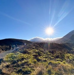 happy guests hike in Tongariro National Park RS03MAR26