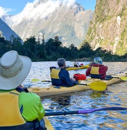 happy guests kayak in Milford Sound PS23MAR26