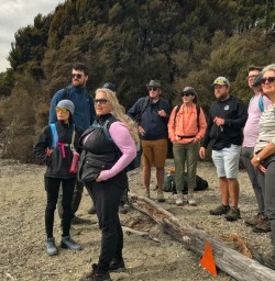 Happy guests on the bank of Lake Manapouri