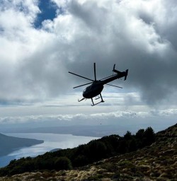 helicopter leaving the luxmore hut