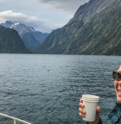 Lady on Milford Sound cruise, Fiordland National Park Southland New Zealand