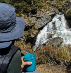 Tea Time in front of Routeburn Track Falls, Fiordland New Zealand