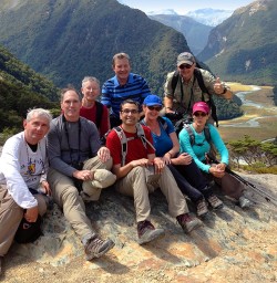walkers in the routeburn valley new zealand