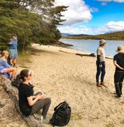 The group take a break to enjoy Lake views on the Kepler